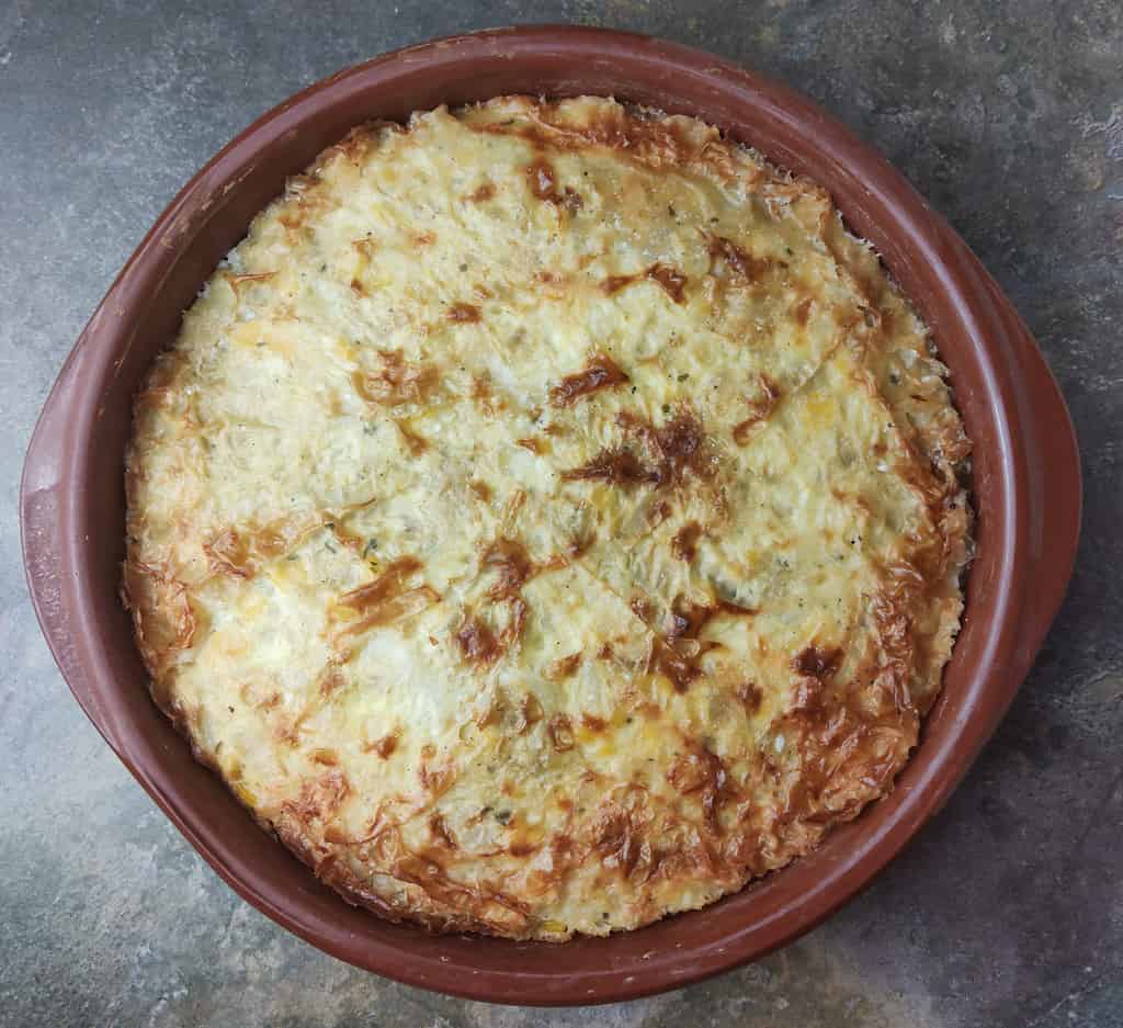 image showing a freshly baked phyllo cabbage pie in a pie pan 