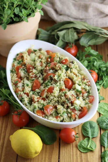 showing freshly made taboule oriental with vegies, spices and bulgur