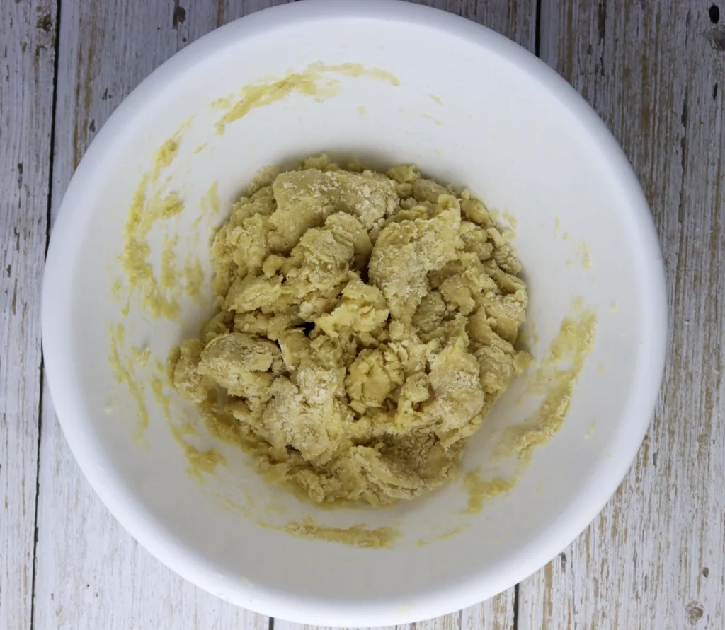 how to stir it all together - mixing the dough for caprese empanadas