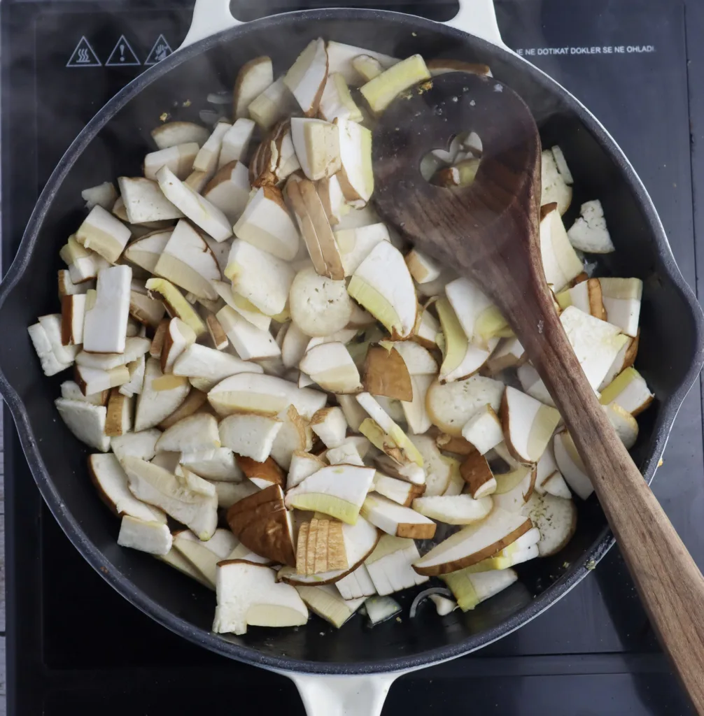 step 6: stir-frying porcini mushrooms for pizza topping