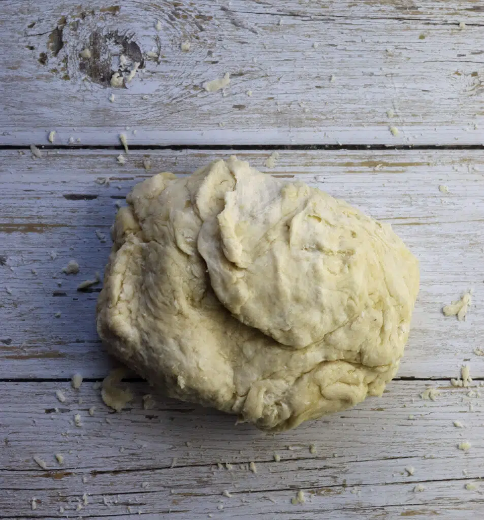 kneading the dough before resting 