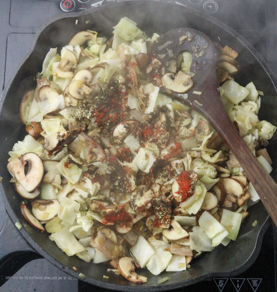 adding spices to the pan 