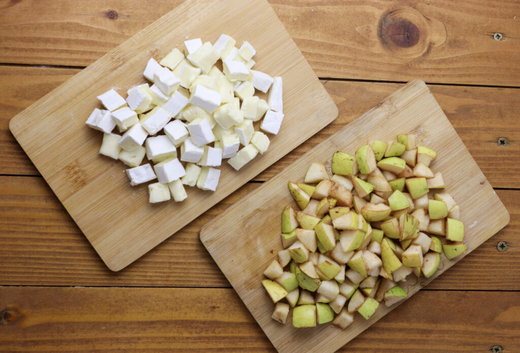 image of how to slice the brie cheese and pears into smaller pieces