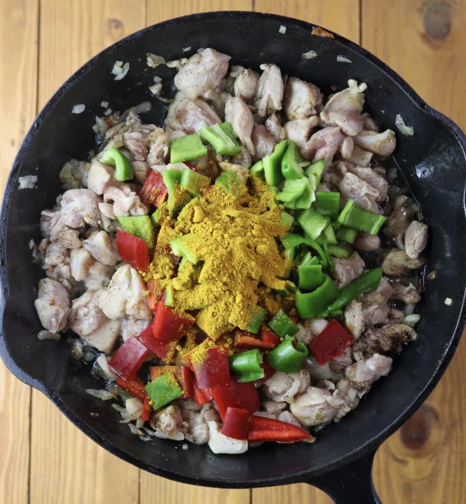 Image showing how to cook the chicken thighs before adding it to curry rice.