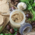 saffron milk cap (lactarius deliciosus) pate in a jar and served on fresh bread